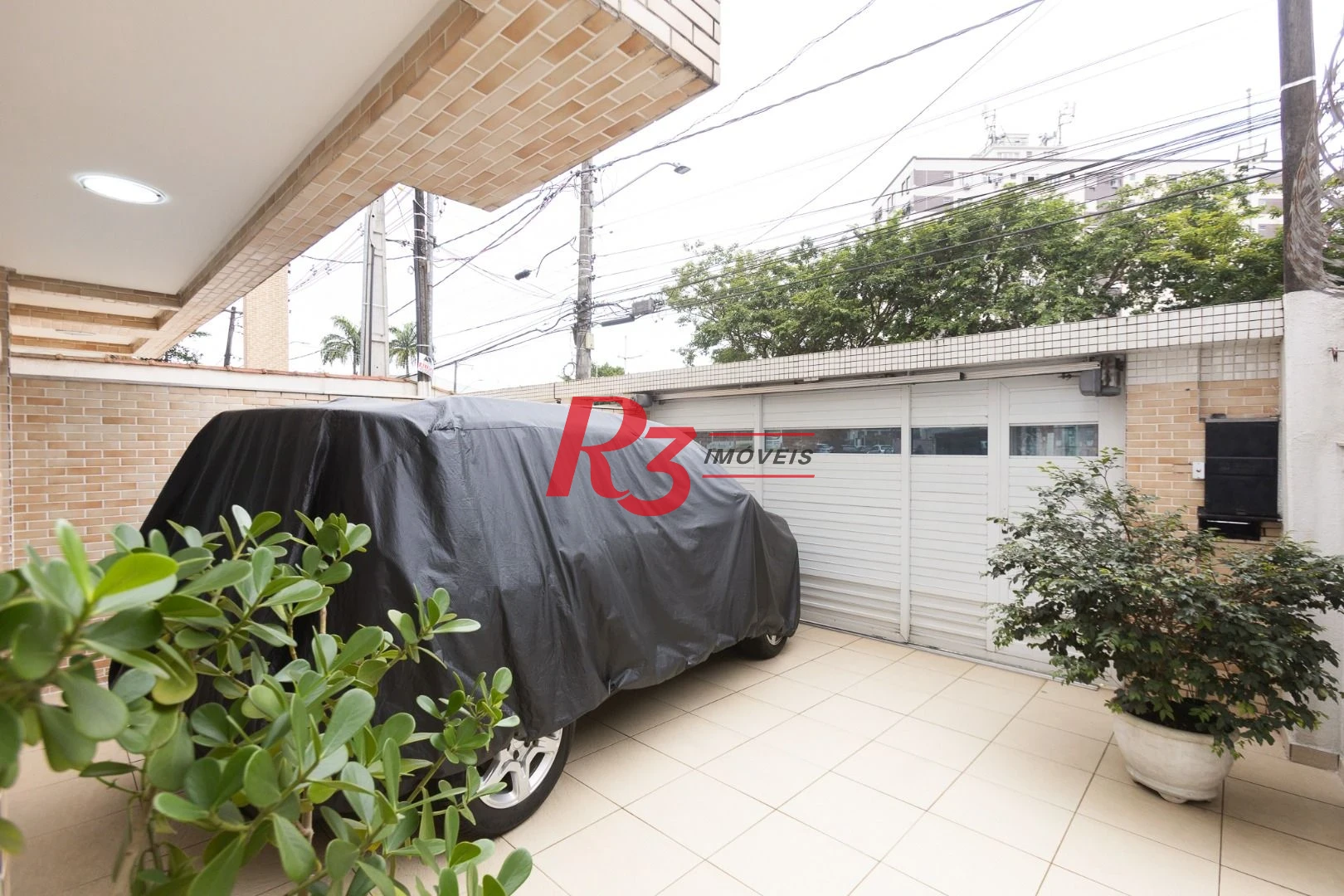 Casa com 3 dormitórios à venda, 123 m² por R$ 720.000,00 - Macuco - Santos/SP