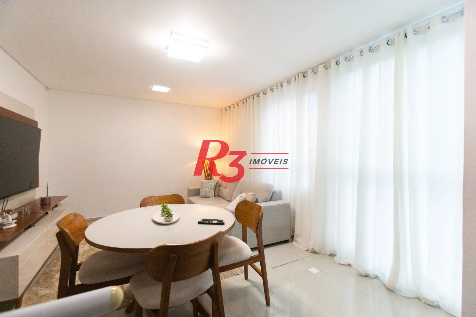 Casa com 3 dormitórios à venda, 123 m² por R$ 720.000,00 - Macuco - Santos/SP