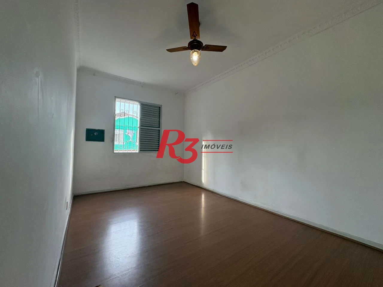 Casa com 3 dormitórios para alugar, 150 m² por R$ 3.000,00/mês - Macuco - Santos/SP
