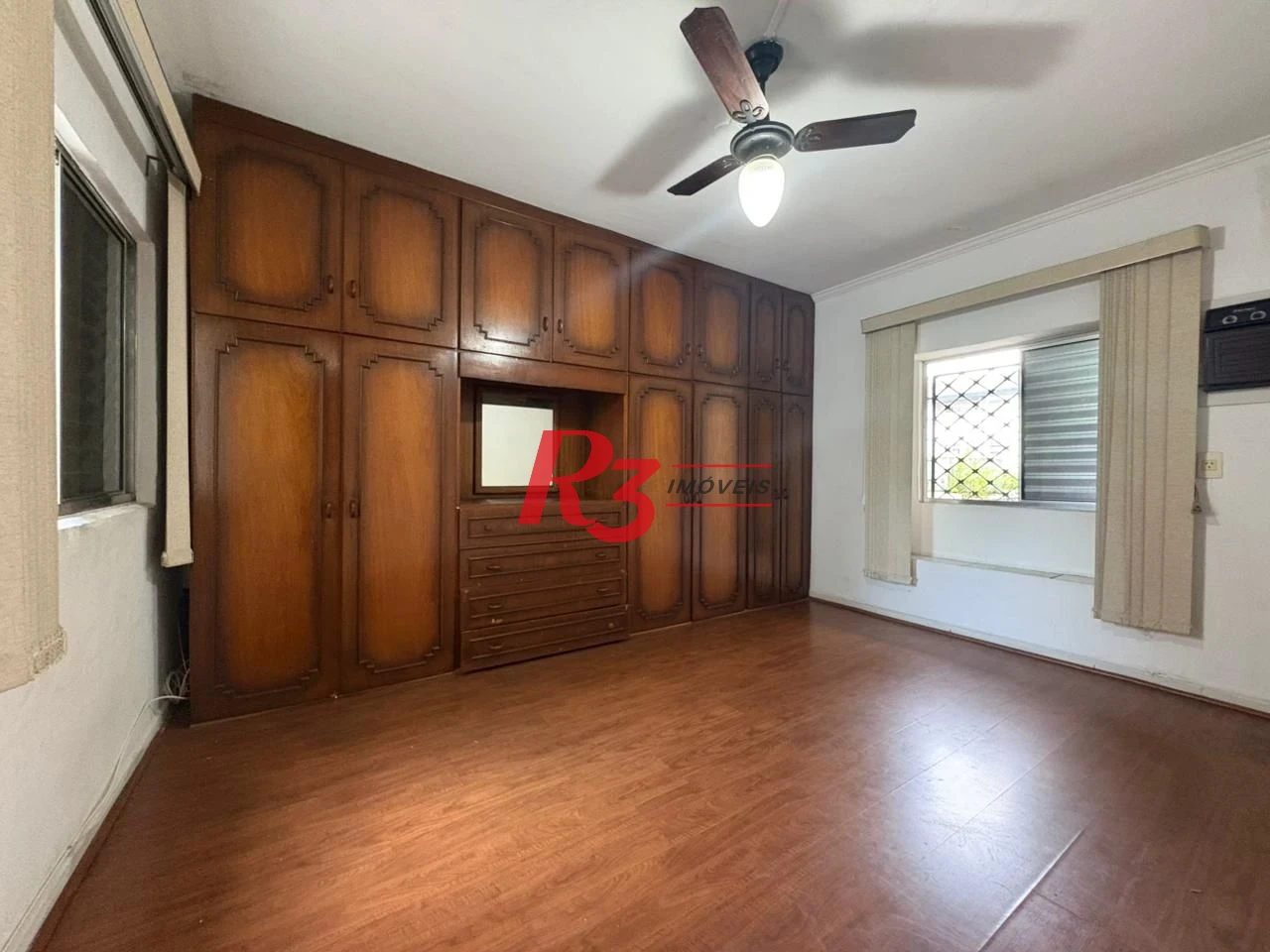 Casa com 3 dormitórios para alugar, 150 m² por R$ 3.000,00/mês - Macuco - Santos/SP