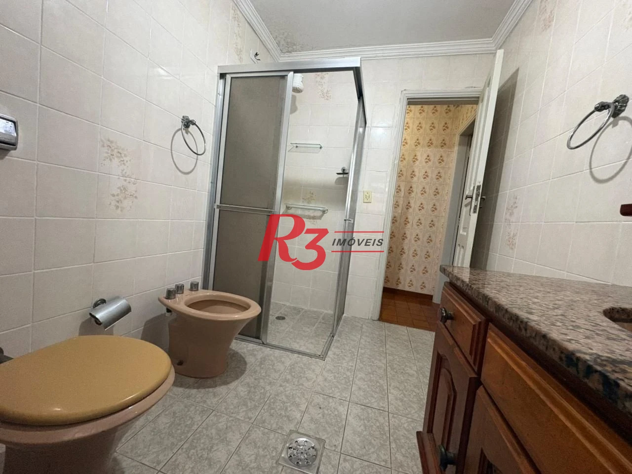 Casa com 3 dormitórios para alugar, 150 m² por R$ 3.000,00/mês - Macuco - Santos/SP