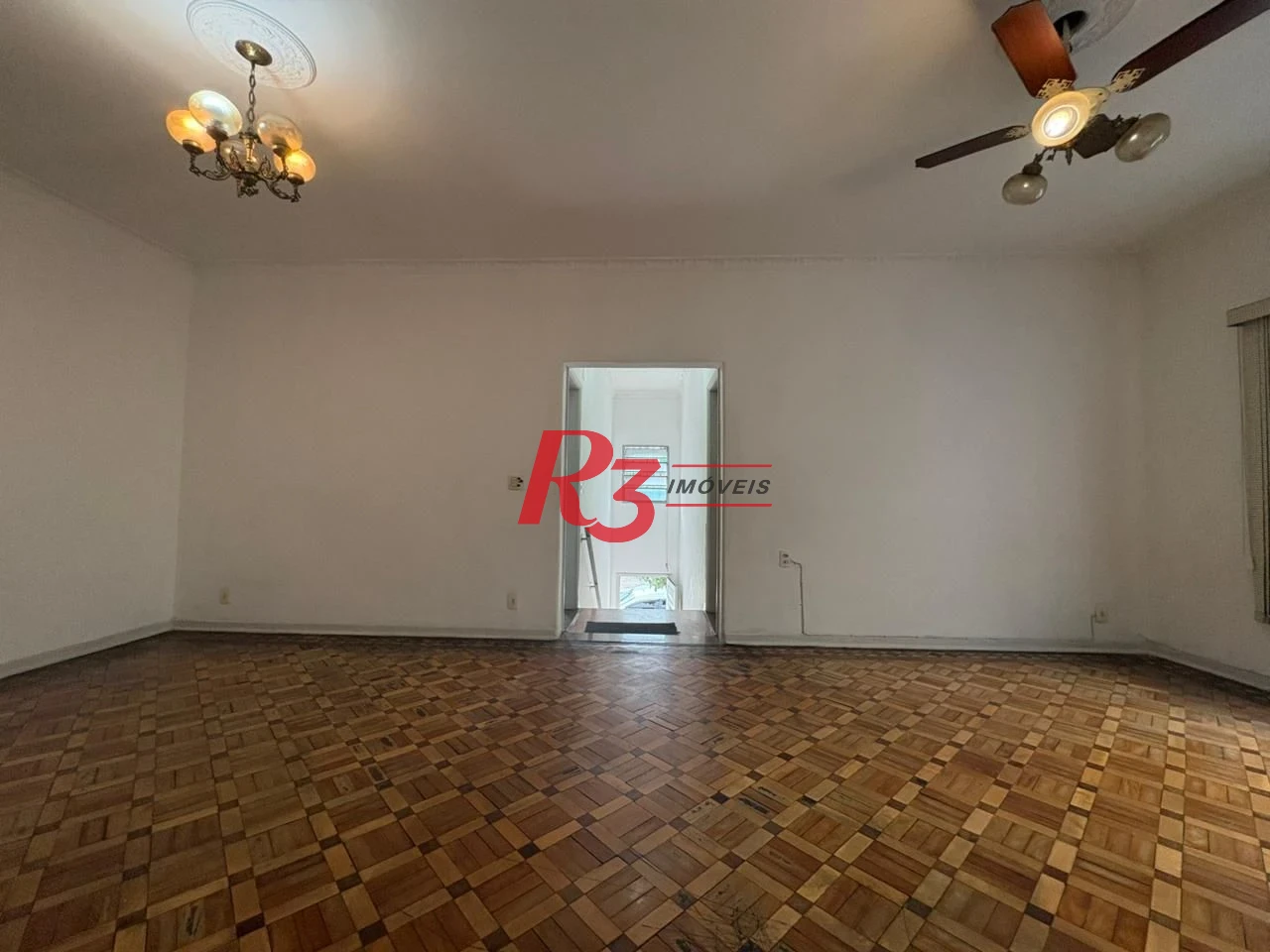 Casa com 3 dormitórios para alugar, 150 m² por R$ 3.000,00/mês - Macuco - Santos/SP