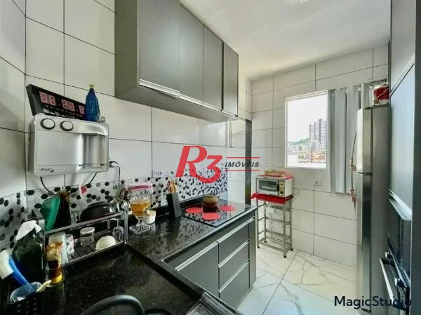 Apartamento com 2 dormitórios à venda, 73 m² por R$ 400.000,00 - Gonzaga - Santos/SP
