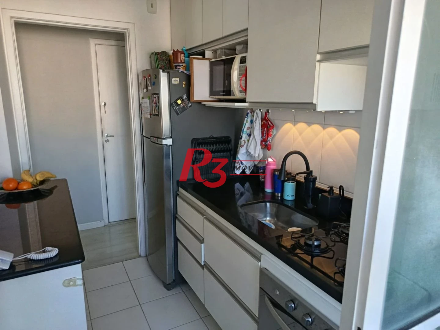 Apartamento com 2 dormitórios à venda, 53 m² por R$ 360.000,00 - Areia Branca - Santos/SP