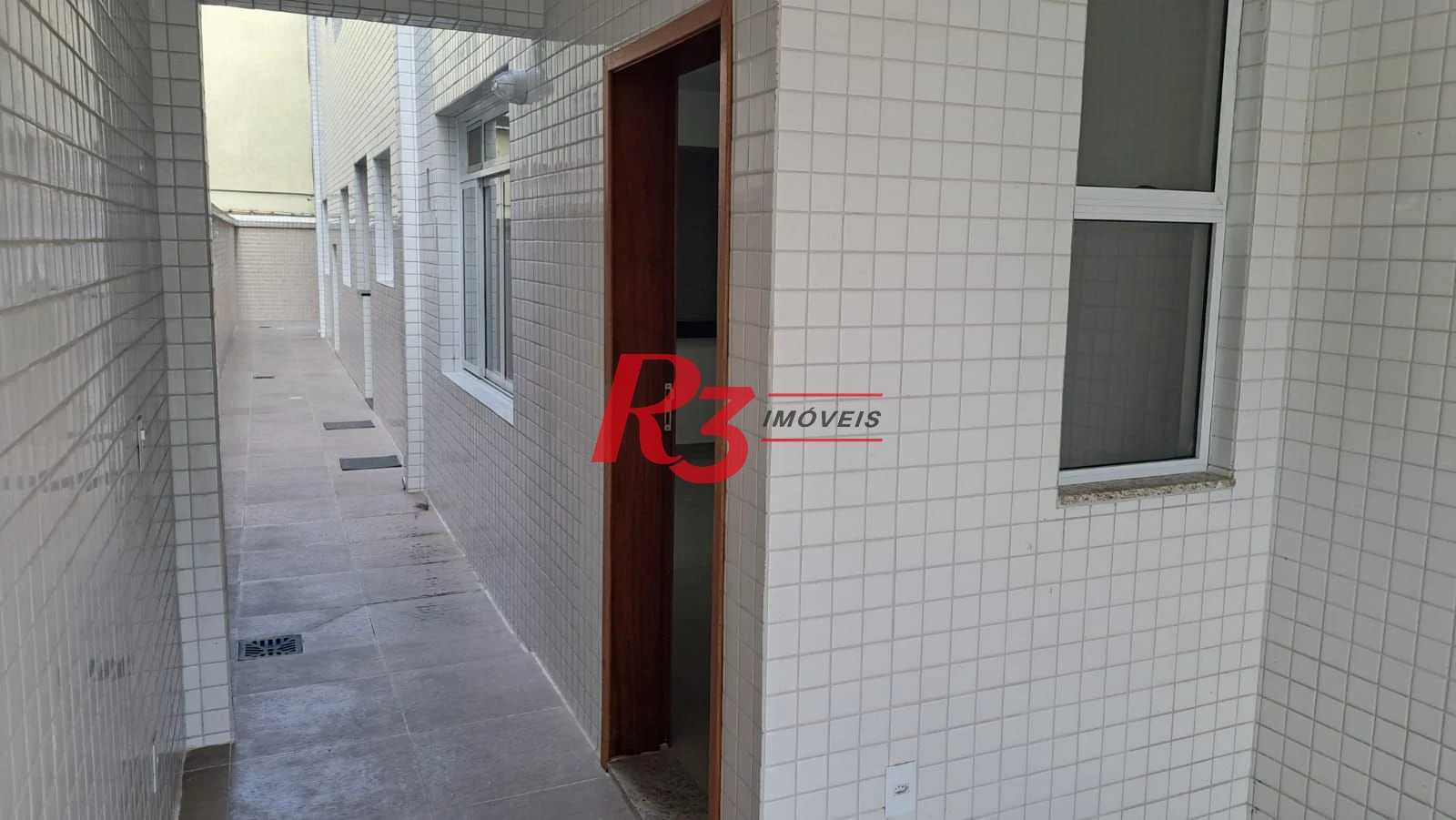 Casa com 3 dormitórios à venda, 1 m² por R$ 950.000,00 - Aparecida - Santos/SP