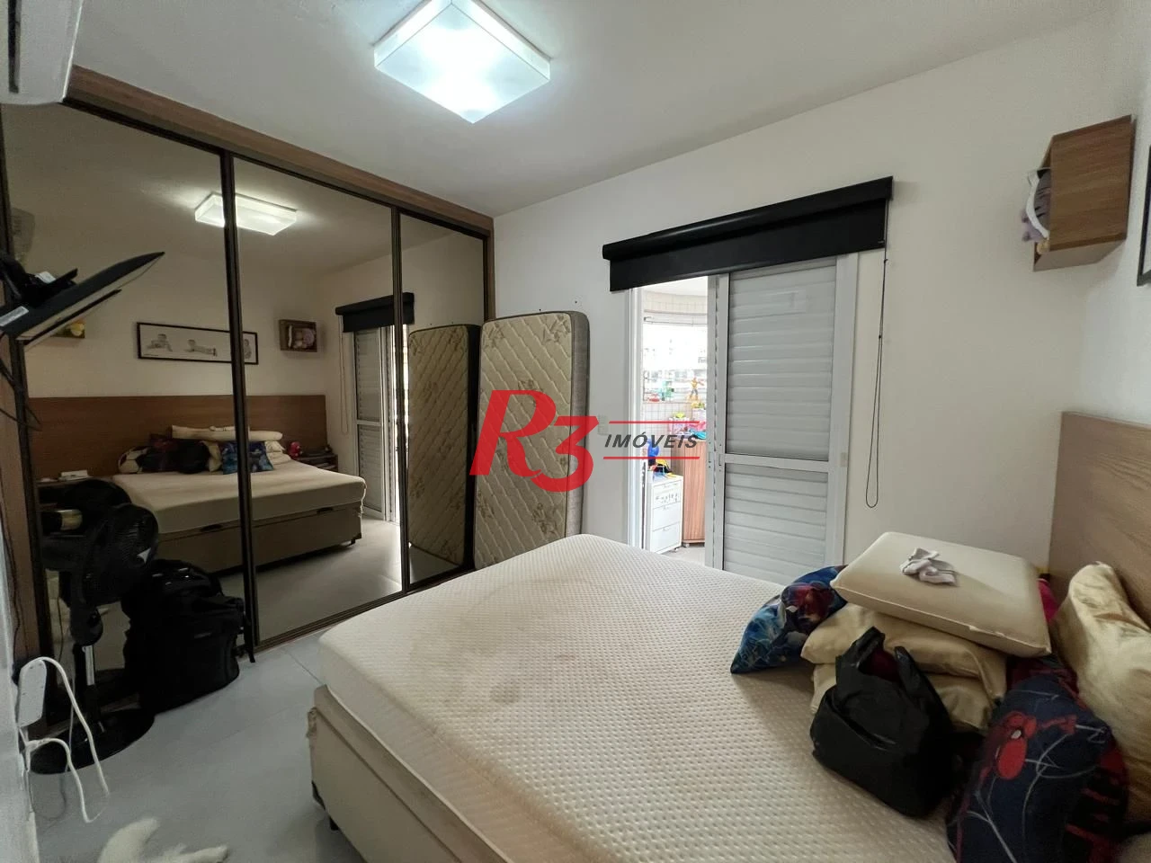Apartamento com 2 dormitórios à venda, 77 m² por R$ 960.000,00 - Gonzaga - Santos/SP