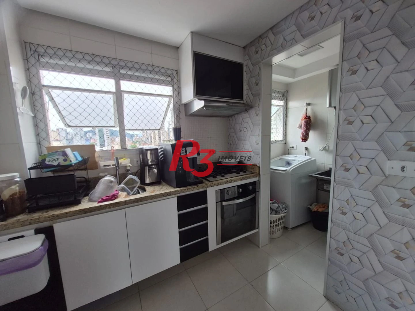 Apartamento com 2 dormitórios à venda, 77 m² por R$ 960.000,00 - Gonzaga - Santos/SP
