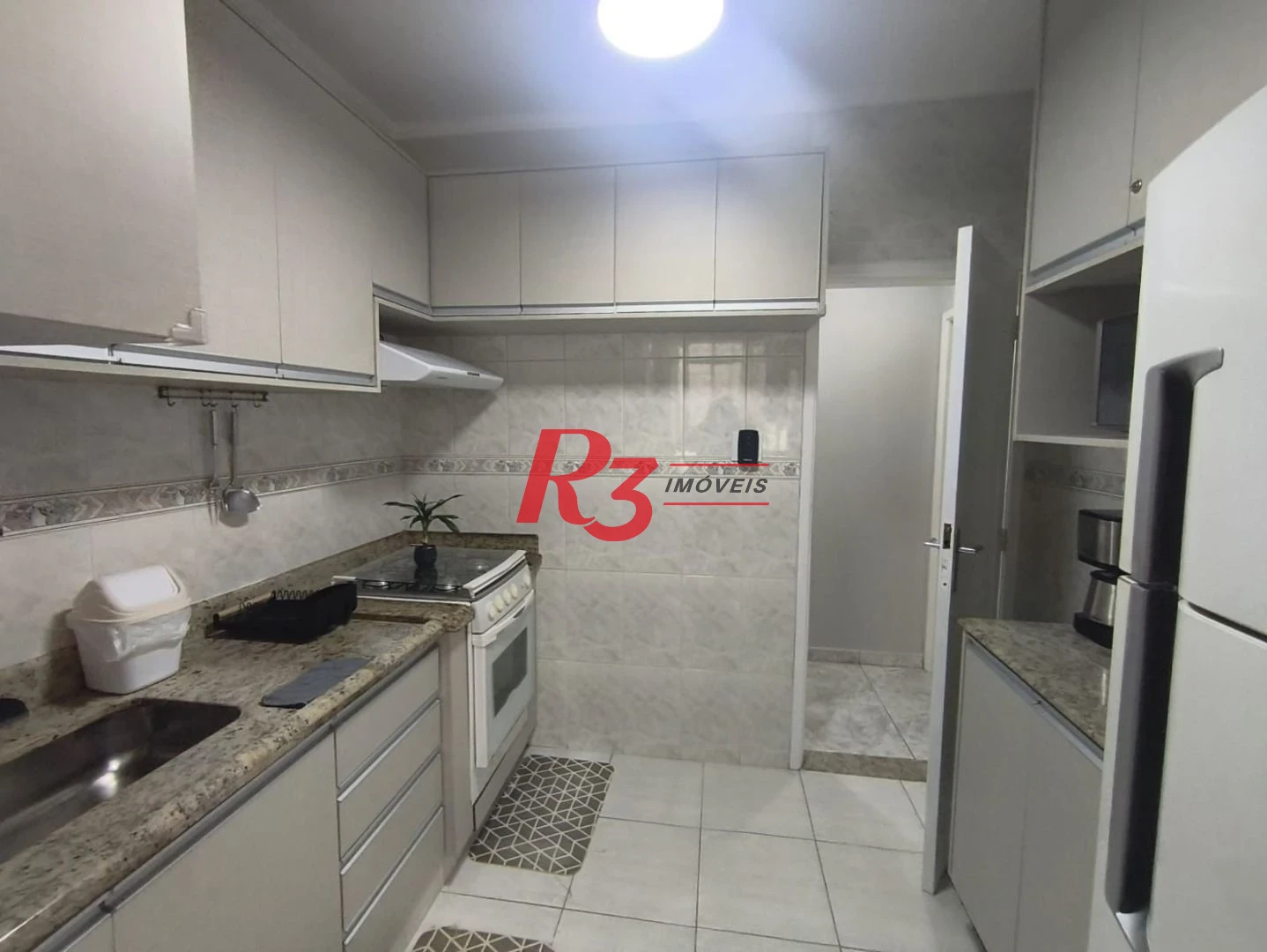 Apartamento com 2 dormitórios à venda, 74 m² por R$ 690.000,00 - Pompéia - Santos/SP