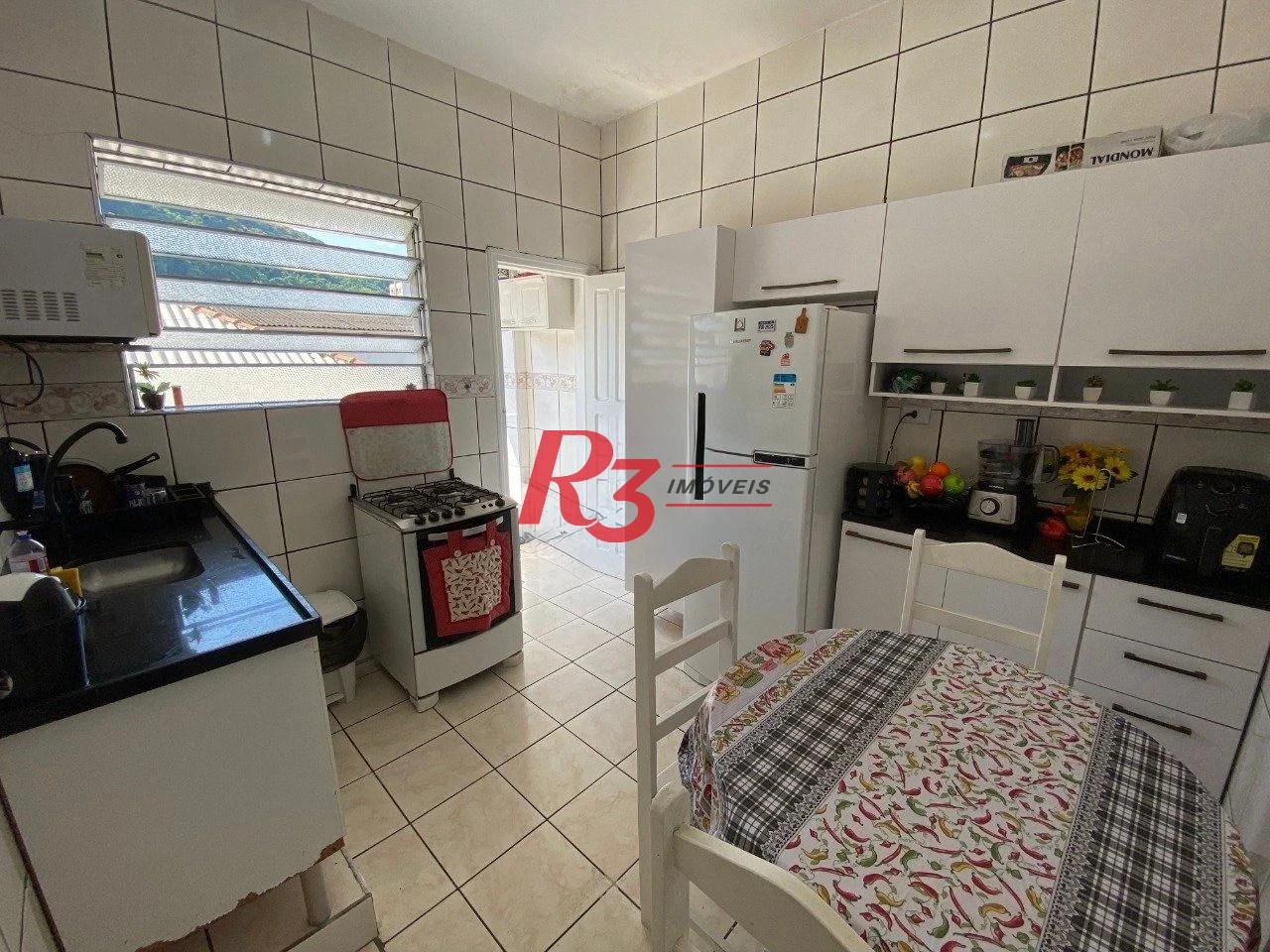 Casa com 3 dormitórios à venda, 95 m² por R$ 450.000,00 - Marapé - Santos/SP