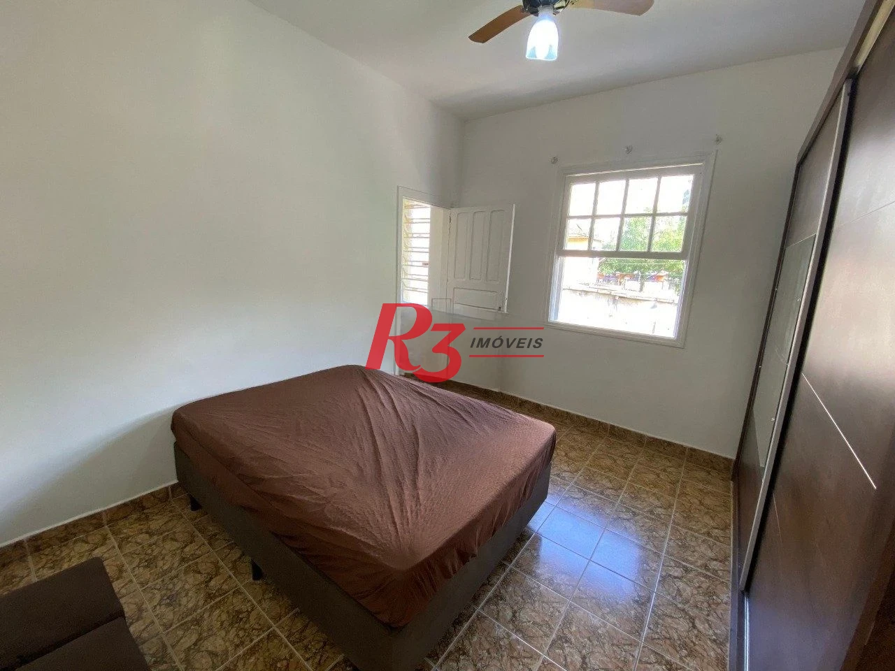 Casa com 3 dormitórios à venda, 95 m² por R$ 450.000,00 - Marapé - Santos/SP