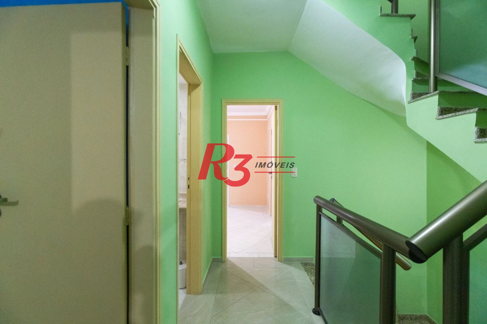 Casa com 3 dormitórios à venda, 142 m² por R$ 1.250.000,00 - Campo Grande - Santos/SP