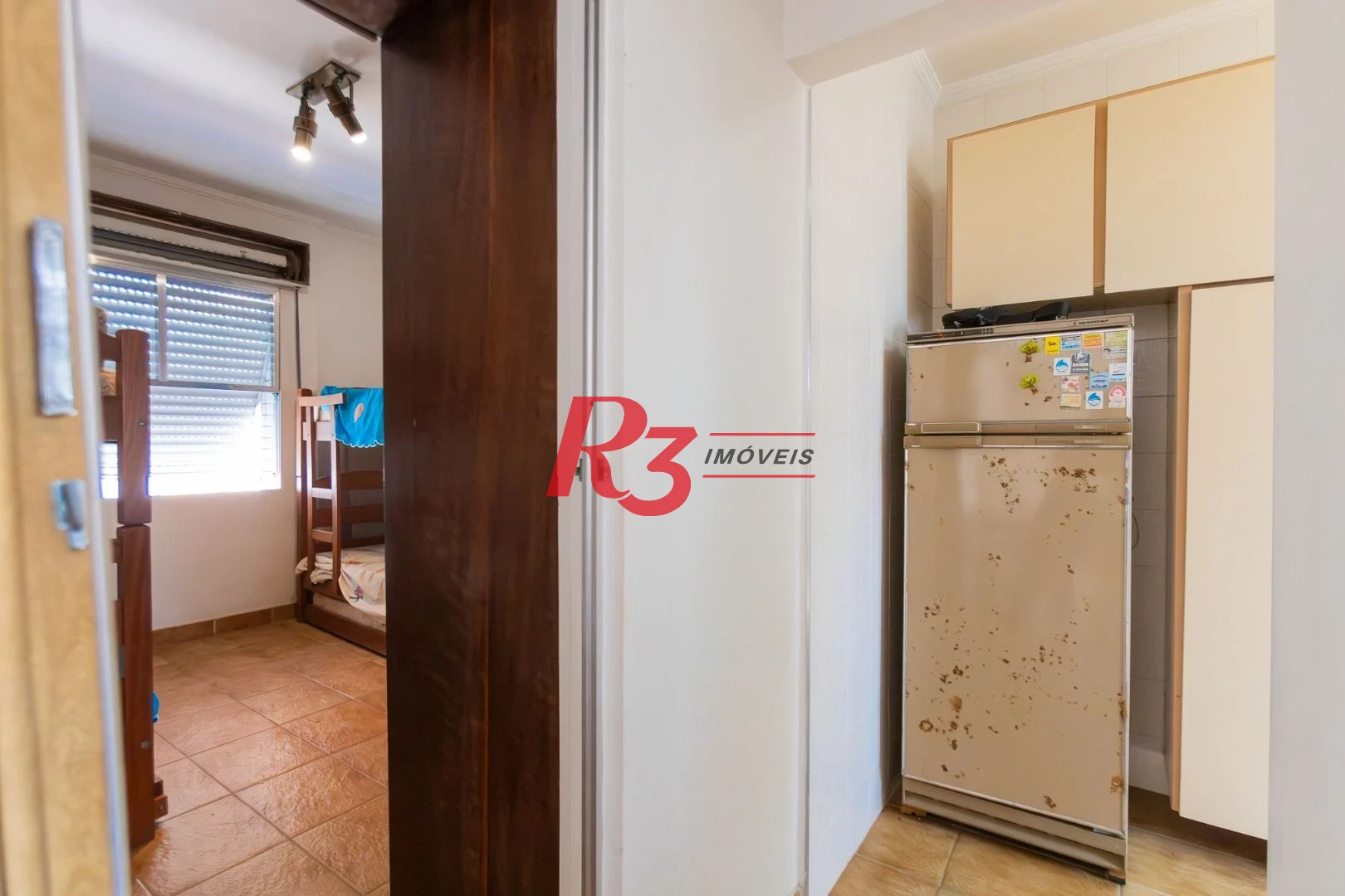 Apartamento com 2 dormitórios à venda, 62 m² por R$ 690.000,00 - Gonzaga - Santos/SP