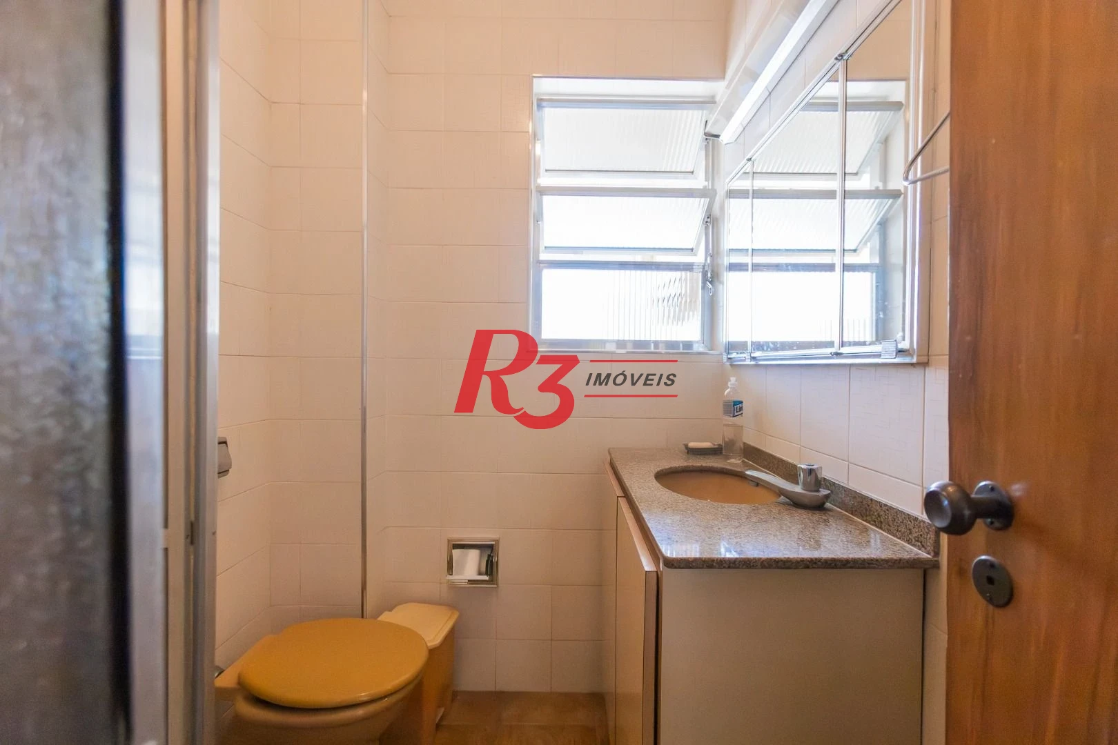Apartamento com 2 dormitórios à venda, 62 m² por R$ 690.000,00 - Gonzaga - Santos/SP