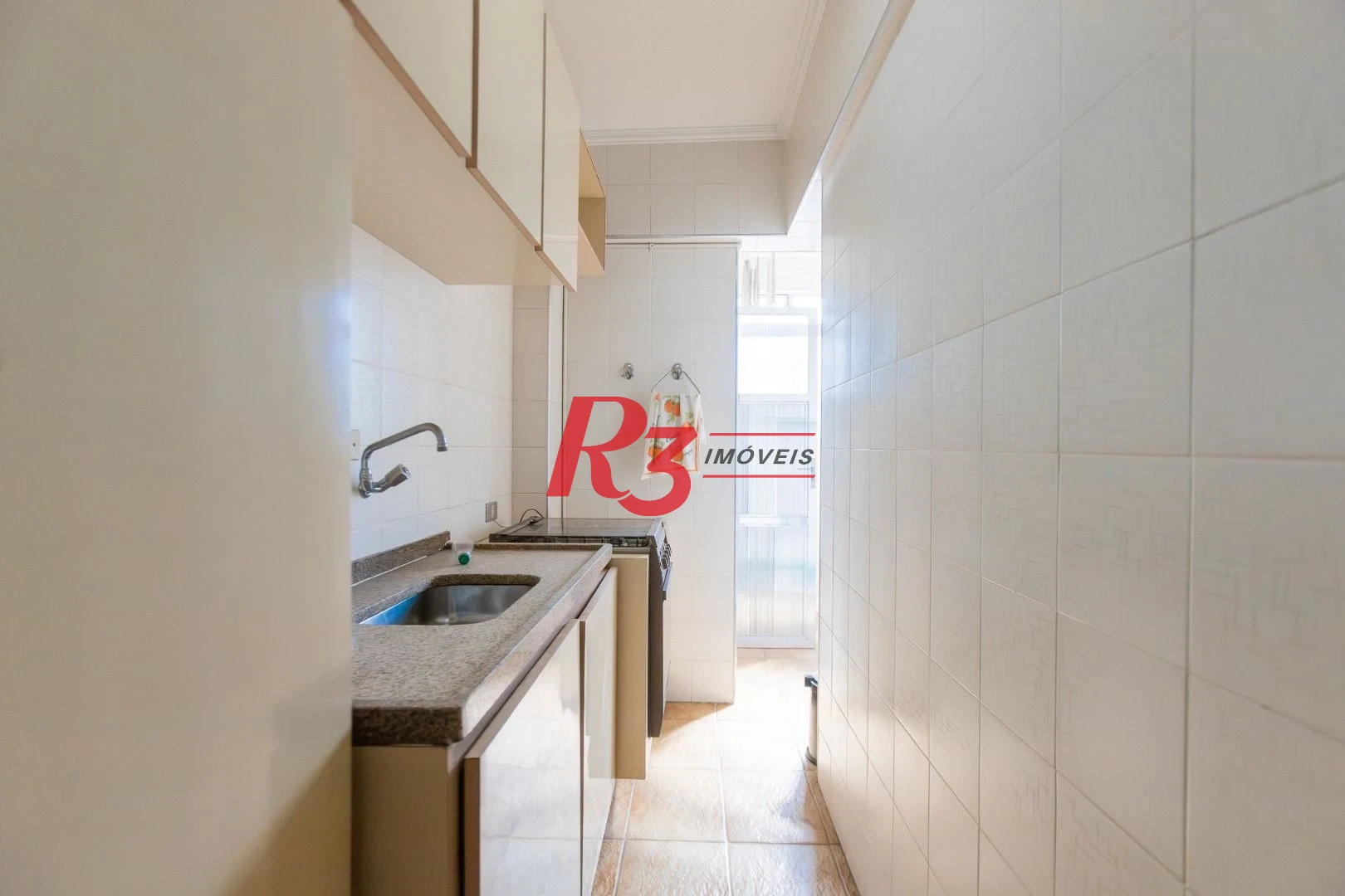 Apartamento com 2 dormitórios à venda, 62 m² por R$ 690.000,00 - Gonzaga - Santos/SP