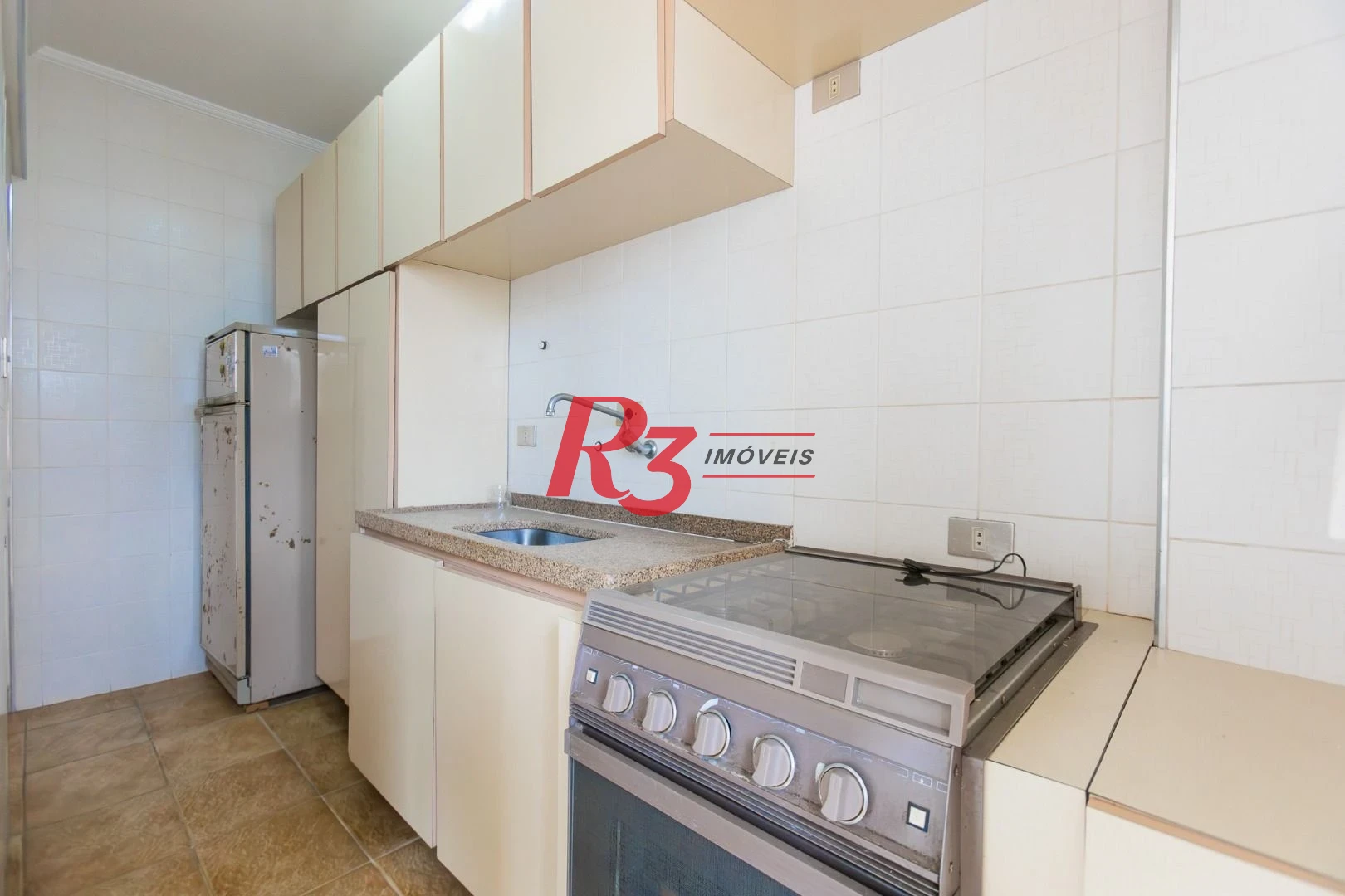 Apartamento com 2 dormitórios à venda, 62 m² por R$ 690.000,00 - Gonzaga - Santos/SP