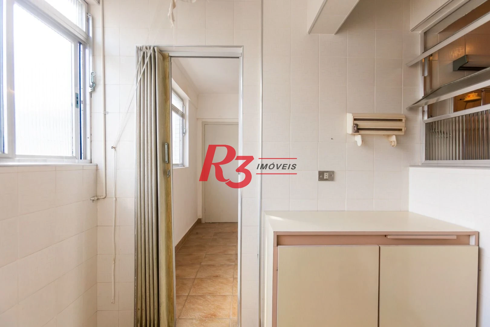 Apartamento com 2 dormitórios à venda, 62 m² por R$ 690.000,00 - Gonzaga - Santos/SP