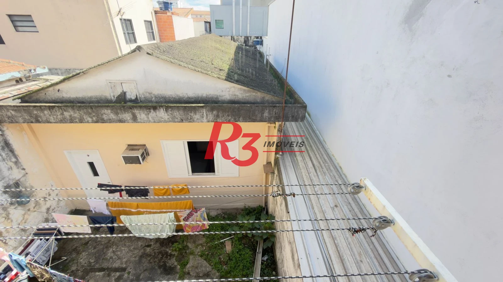 Casa com 3 dormitórios à venda, 300 m² por R$ 1.200.000,00 - Estuário - Santos/SP