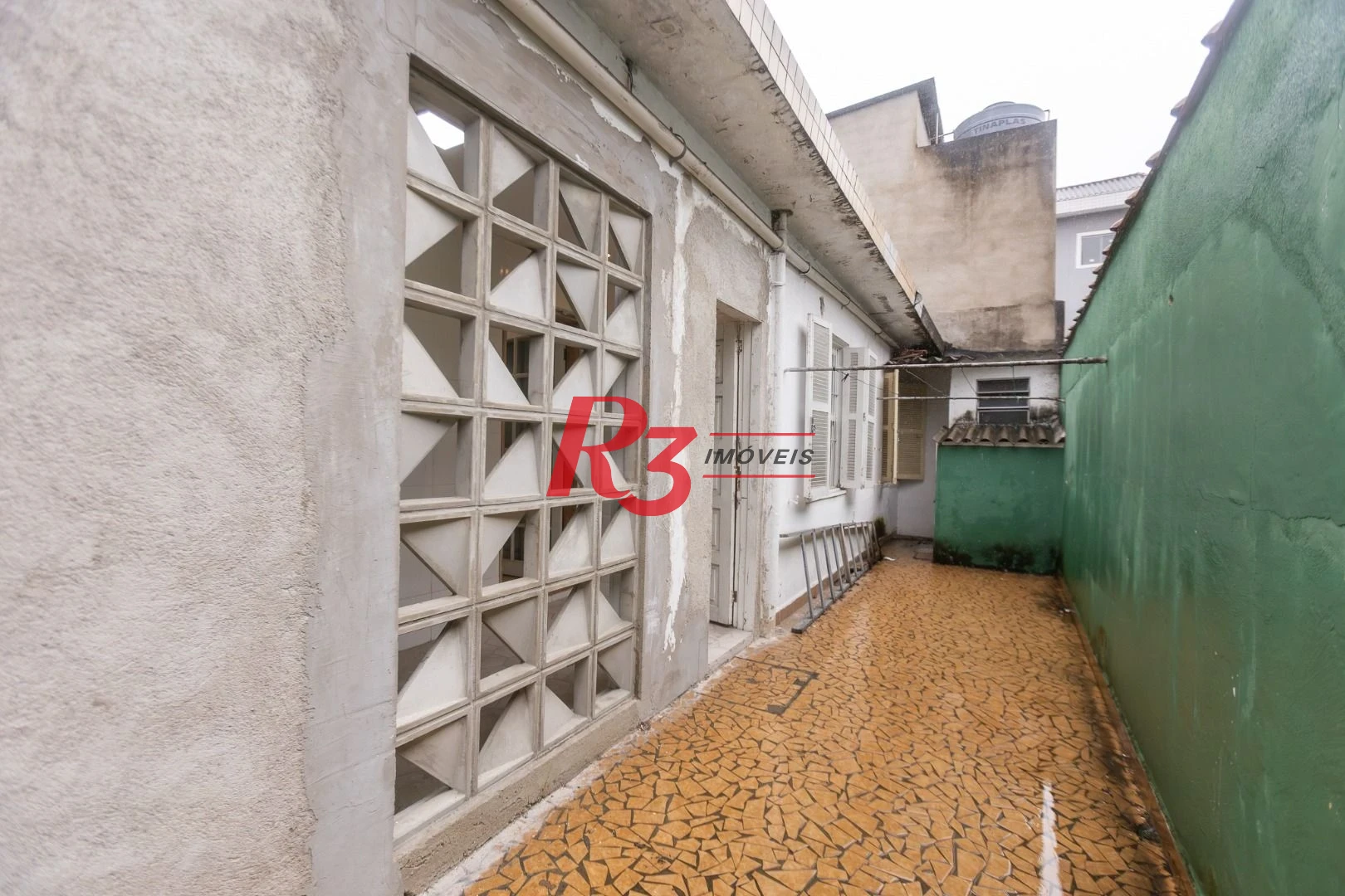 Casa com 3 dormitórios à venda, 229 m² por R$ 480.000,00 - Santa Maria - Santos/SP