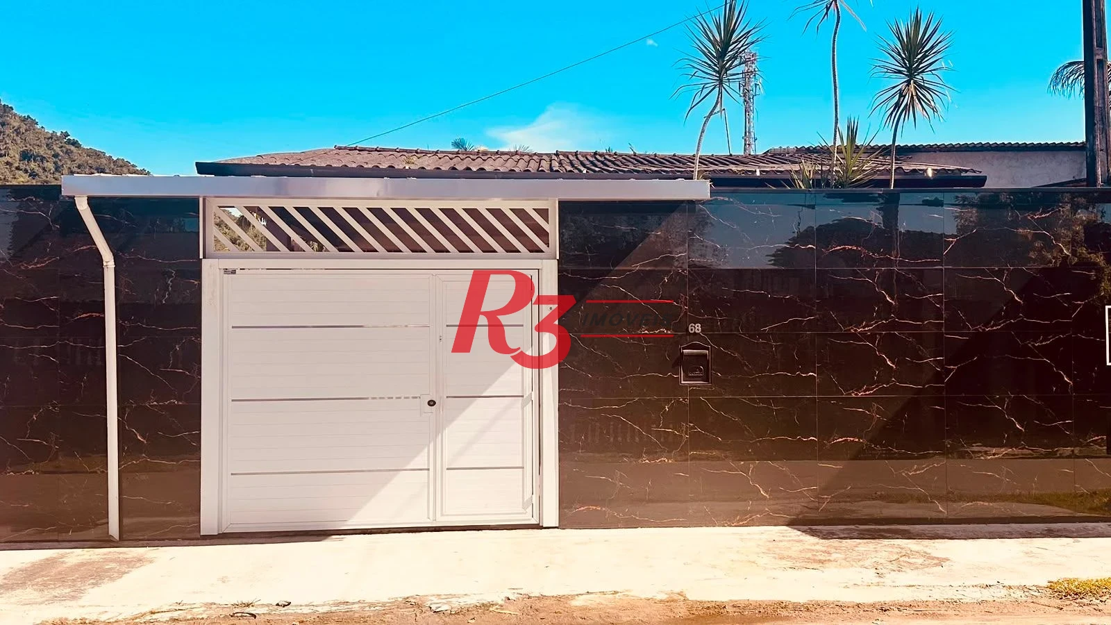 Casa com 3 dormitórios à venda, 250 m² por R$ 640.000,00 - Vila Progresso - Santos/SP