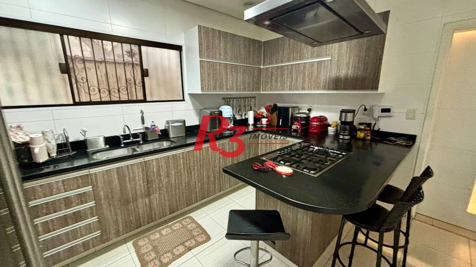 Sobrado com 4 dormitórios à venda, 276 m² por R$ 2.000.000,00 - Boqueirão - Santos/SP