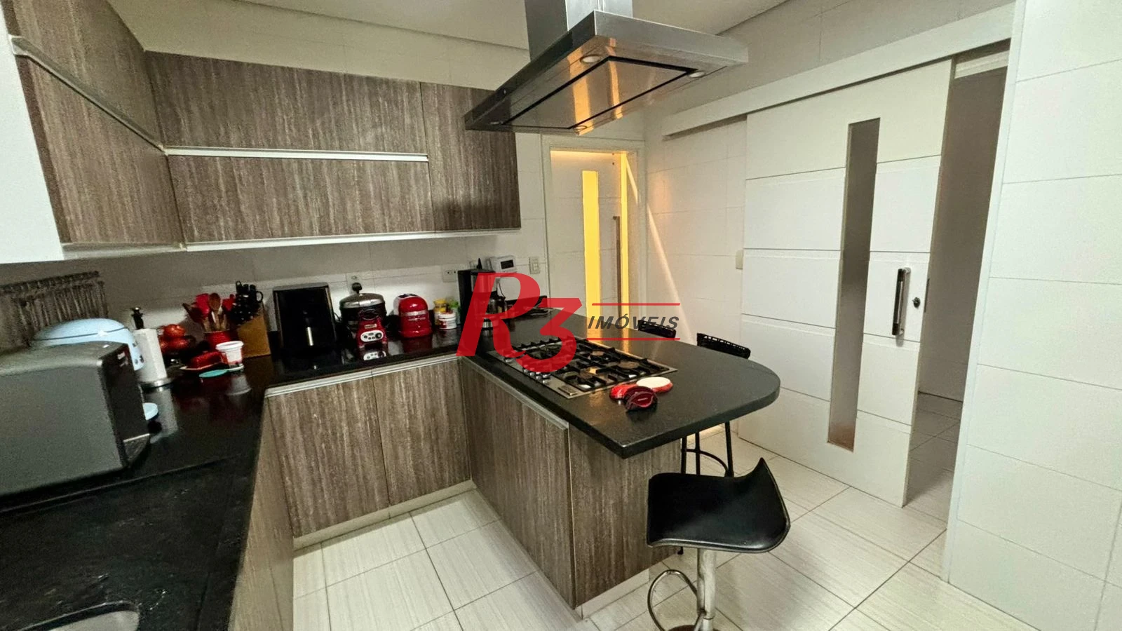 Sobrado com 4 dormitórios à venda, 276 m² por R$ 2.000.000,00 - Boqueirão - Santos/SP