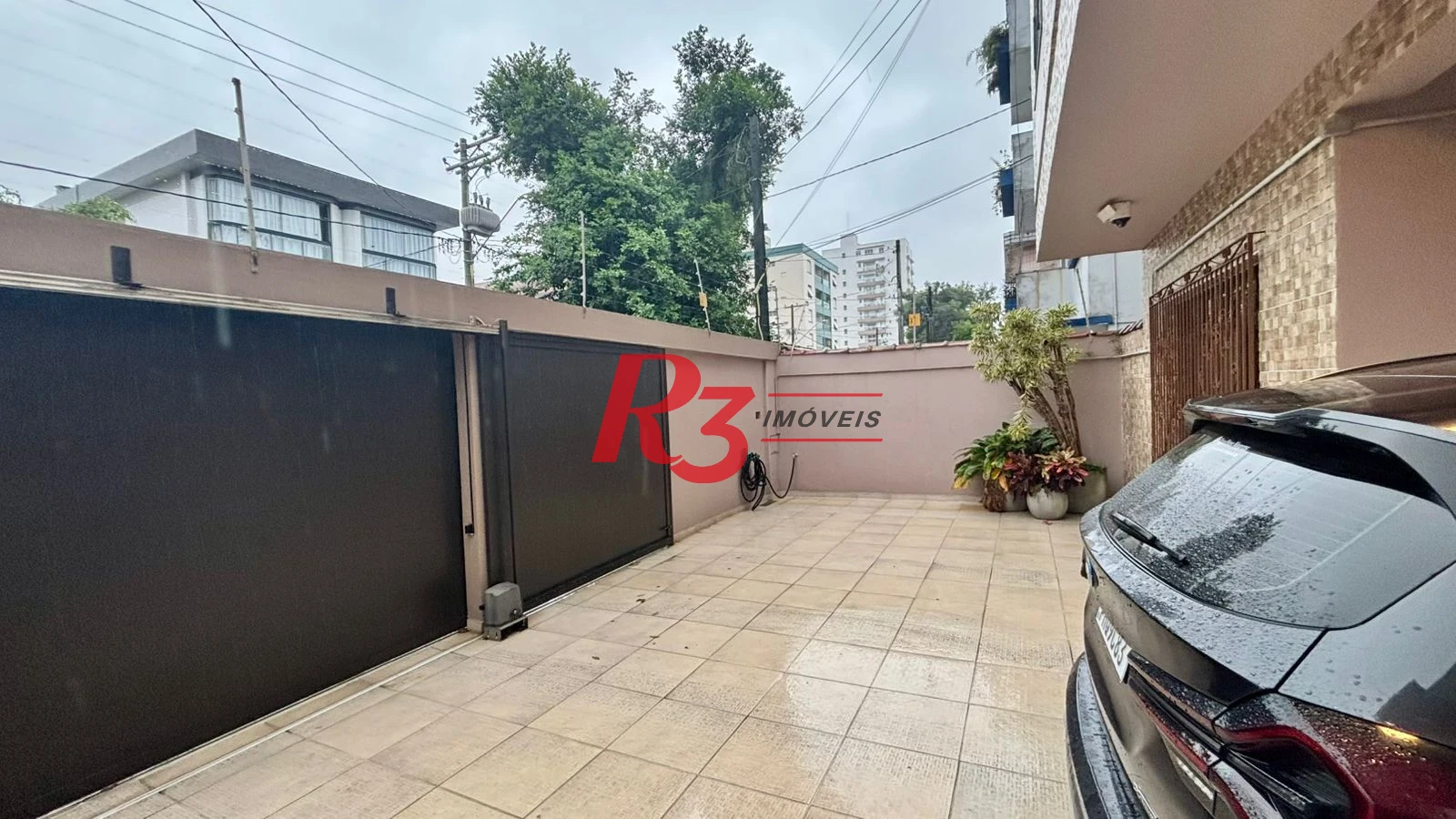 Sobrado com 4 dormitórios à venda, 276 m² por R$ 2.000.000,00 - Boqueirão - Santos/SP