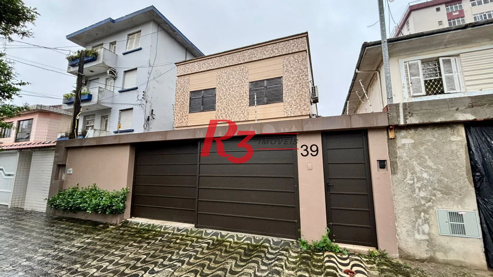 Sobrado com 4 dormitórios à venda, 276 m² por R$ 2.000.000,00 - Boqueirão - Santos/SP