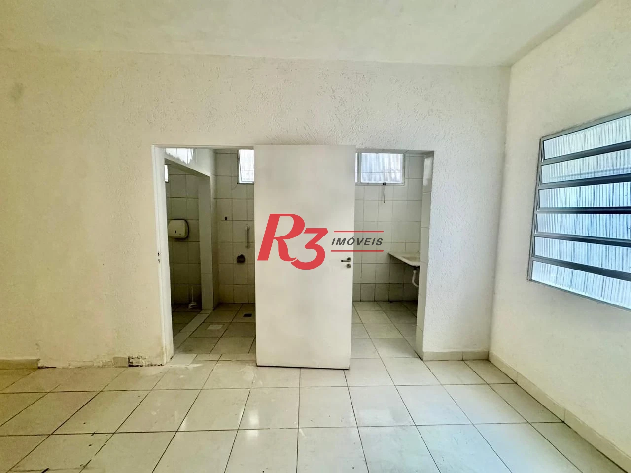 Prédio, 220 m² - venda por R$ 2.300.000,00 ou aluguel por R$ 10.000,00/mês - Gonzaga - Santos/SP