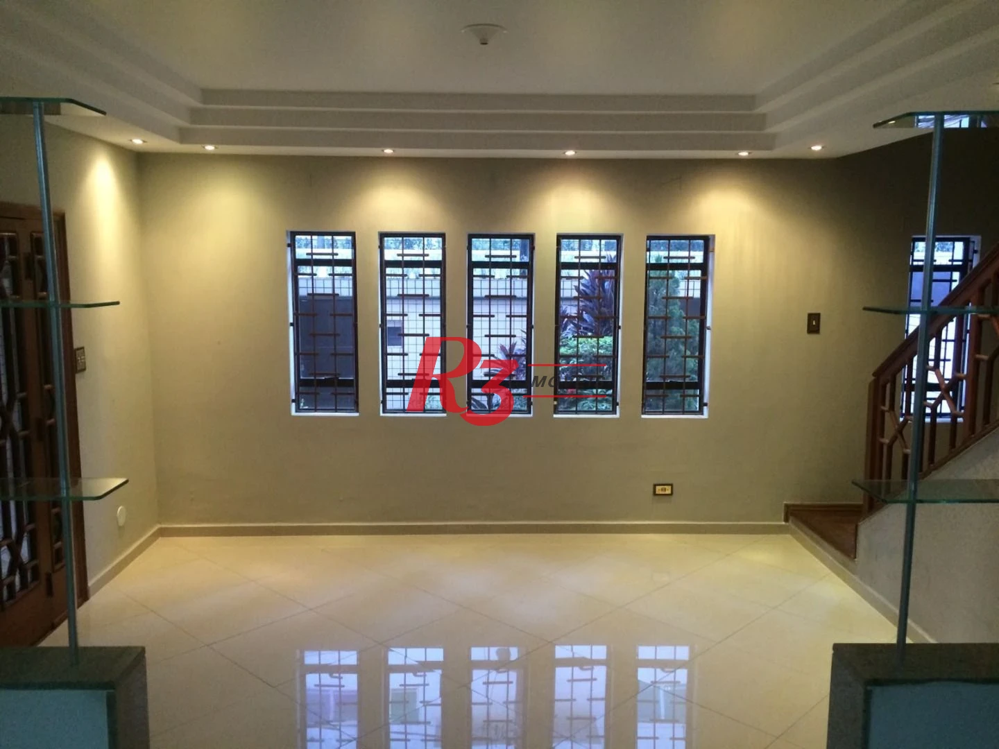 Casa com 5 dormitórios, 270 m² - venda por R$ 2.075.000,00 ou aluguel por R$ 11.500,00/mês - Ponta da Praia - Santos/SP