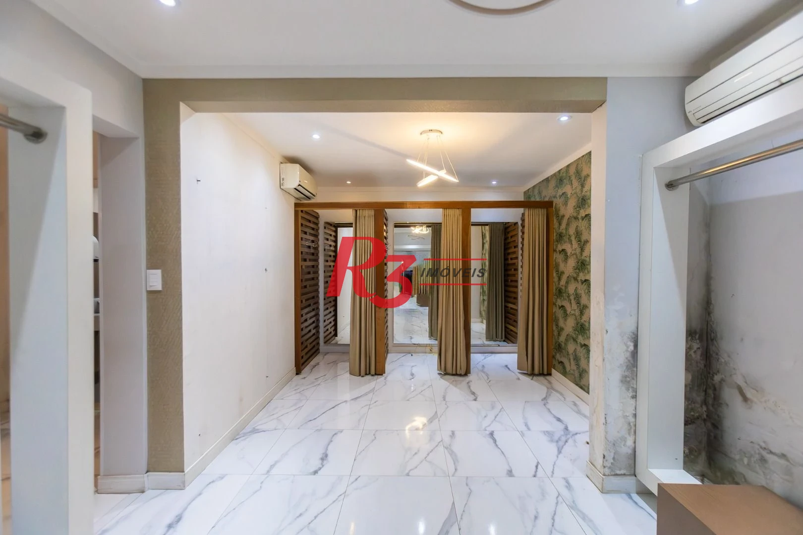 Sobrado com 3 dormitórios para alugar, 200 m² por R$ 15.000,01/mês - Gonzaga - Santos/SP