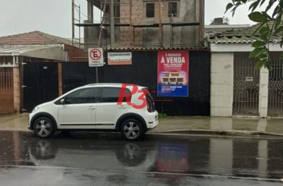 Casa com 3 dormitórios à venda, 100 m² por R$ 700.000,00 - Estuário - Santos/SP