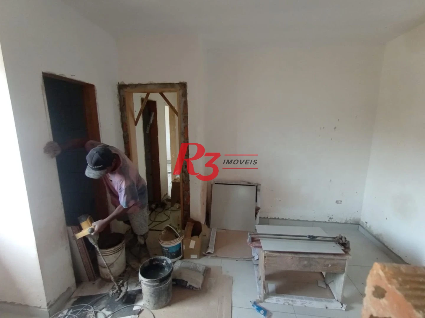 Casa com 3 dormitórios à venda, 100 m² por R$ 700.000,00 - Estuário - Santos/SP