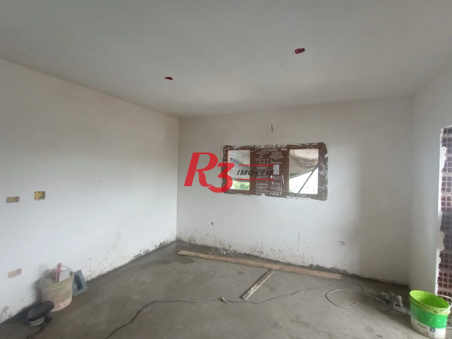 Casa com 3 dormitórios à venda, 100 m² por R$ 700.000,00 - Estuário - Santos/SP