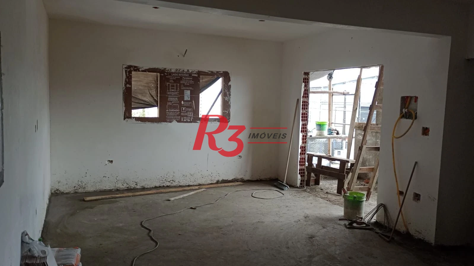 Casa com 3 dormitórios à venda, 100 m² por R$ 700.000,00 - Estuário - Santos/SP