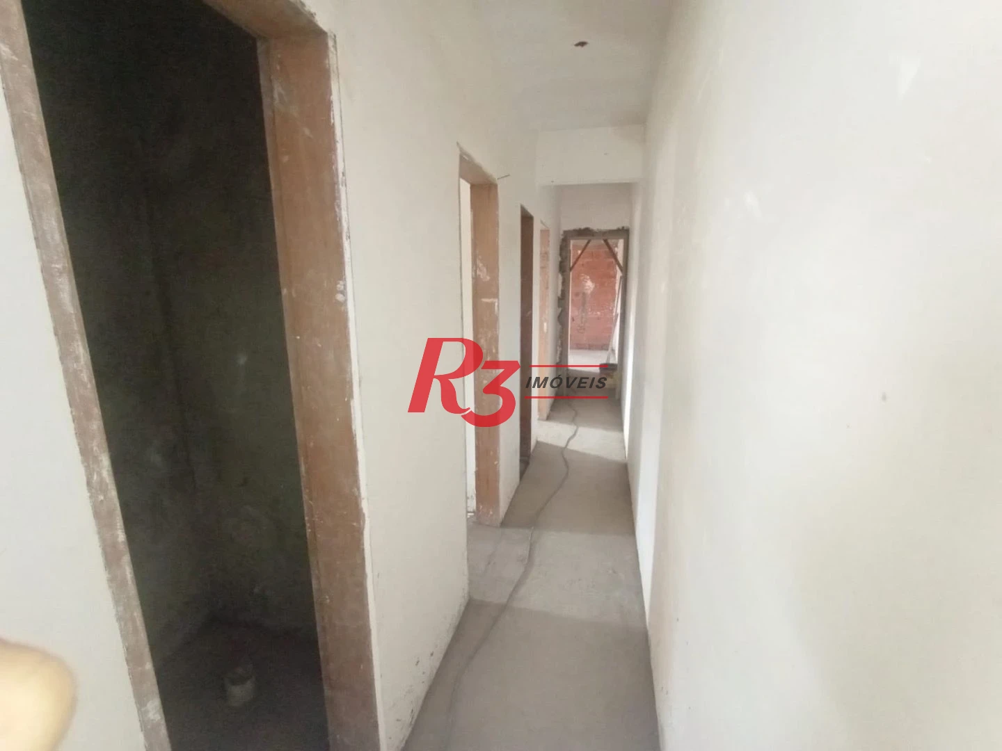 Casa com 3 dormitórios à venda, 100 m² por R$ 700.000,00 - Estuário - Santos/SP