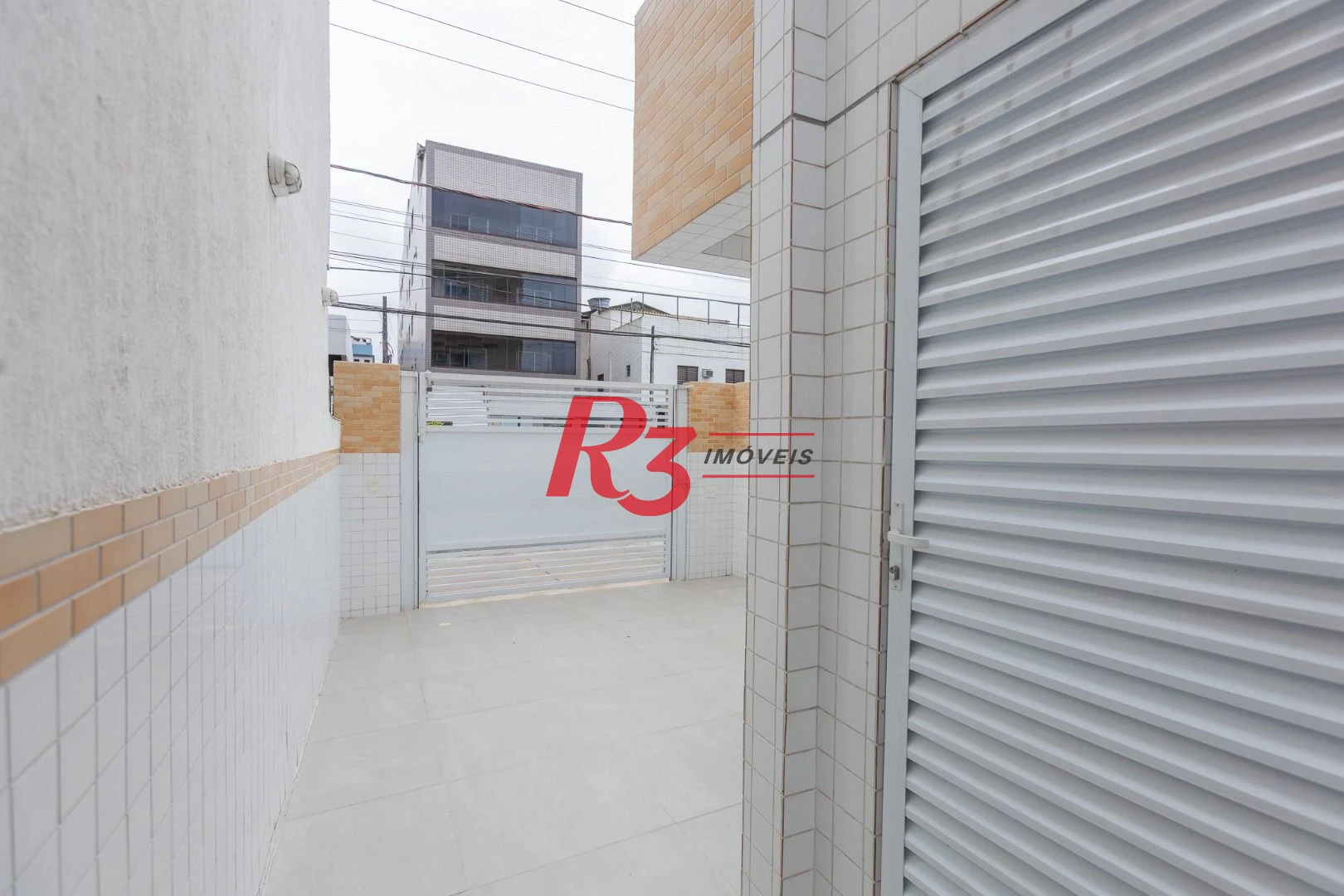 Village com 3 dormitórios à venda, 122 m² por R$ 900.000,00 - Aparecida - Santos/SP