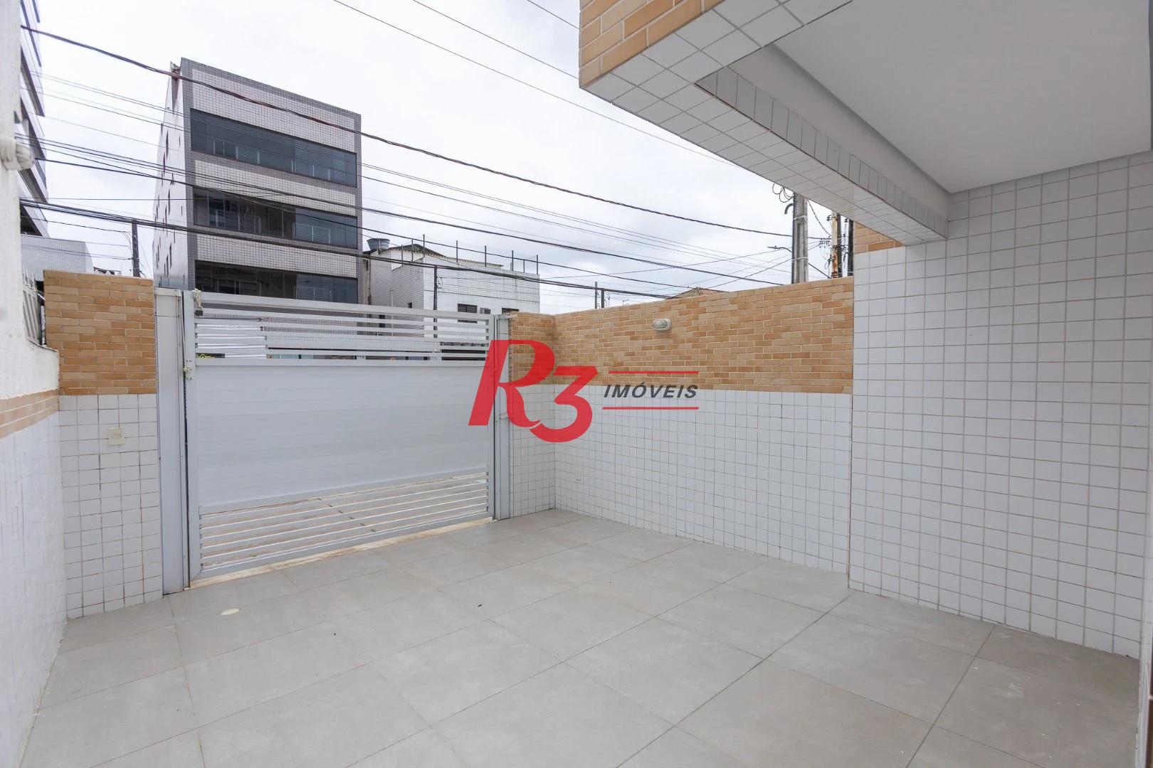 Village com 3 dormitórios à venda, 122 m² por R$ 900.000,00 - Aparecida - Santos/SP