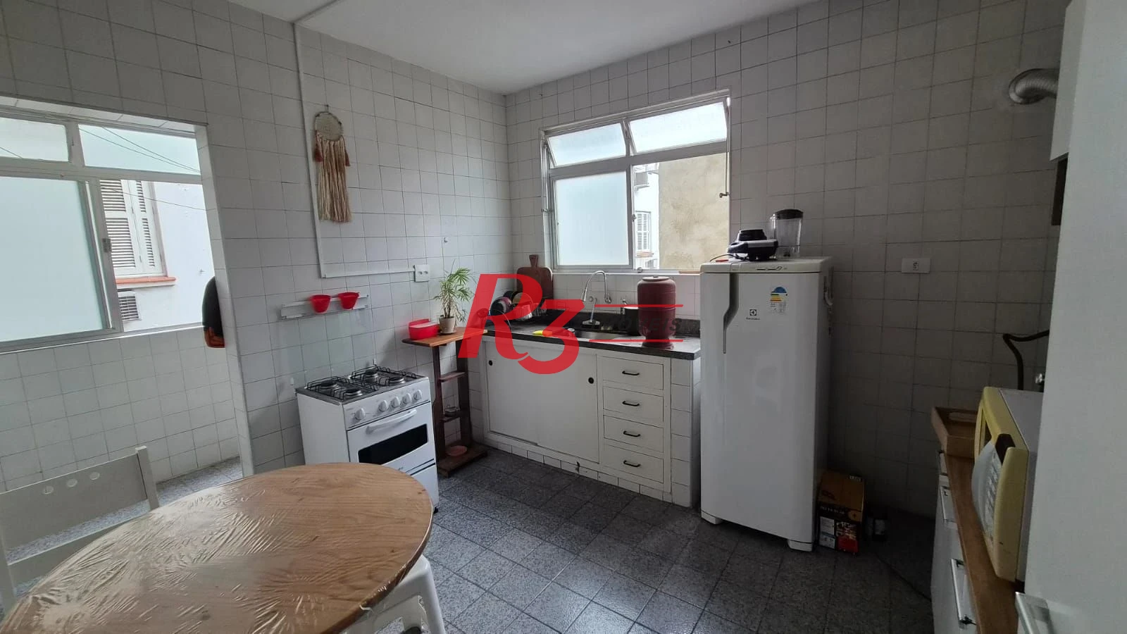 Apartamento com 2 dormitórios à venda, 75 m² por R$ 630.000,00 - Gonzaga - Santos/SP