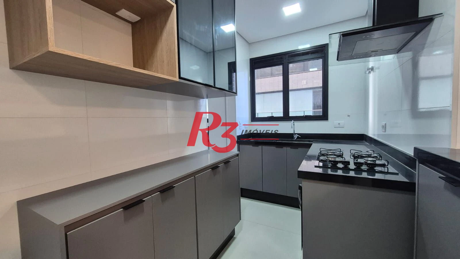 Apartamento com 1 dormitório para alugar, 55 m² por R$ 5.100,02/mês - Aparecida - Santos/SP
