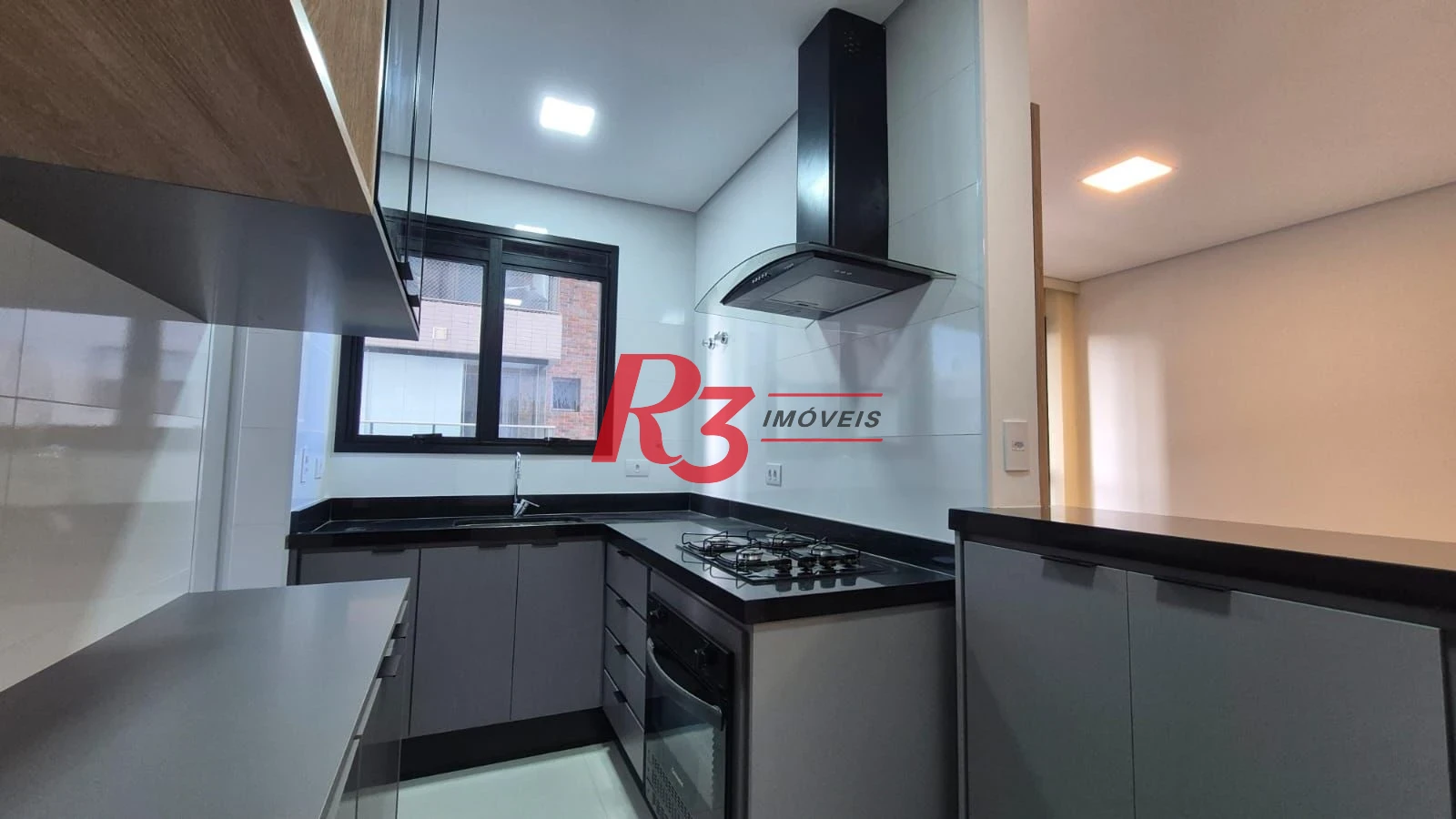 Apartamento com 1 dormitório para alugar, 55 m² por R$ 5.100,02/mês - Aparecida - Santos/SP