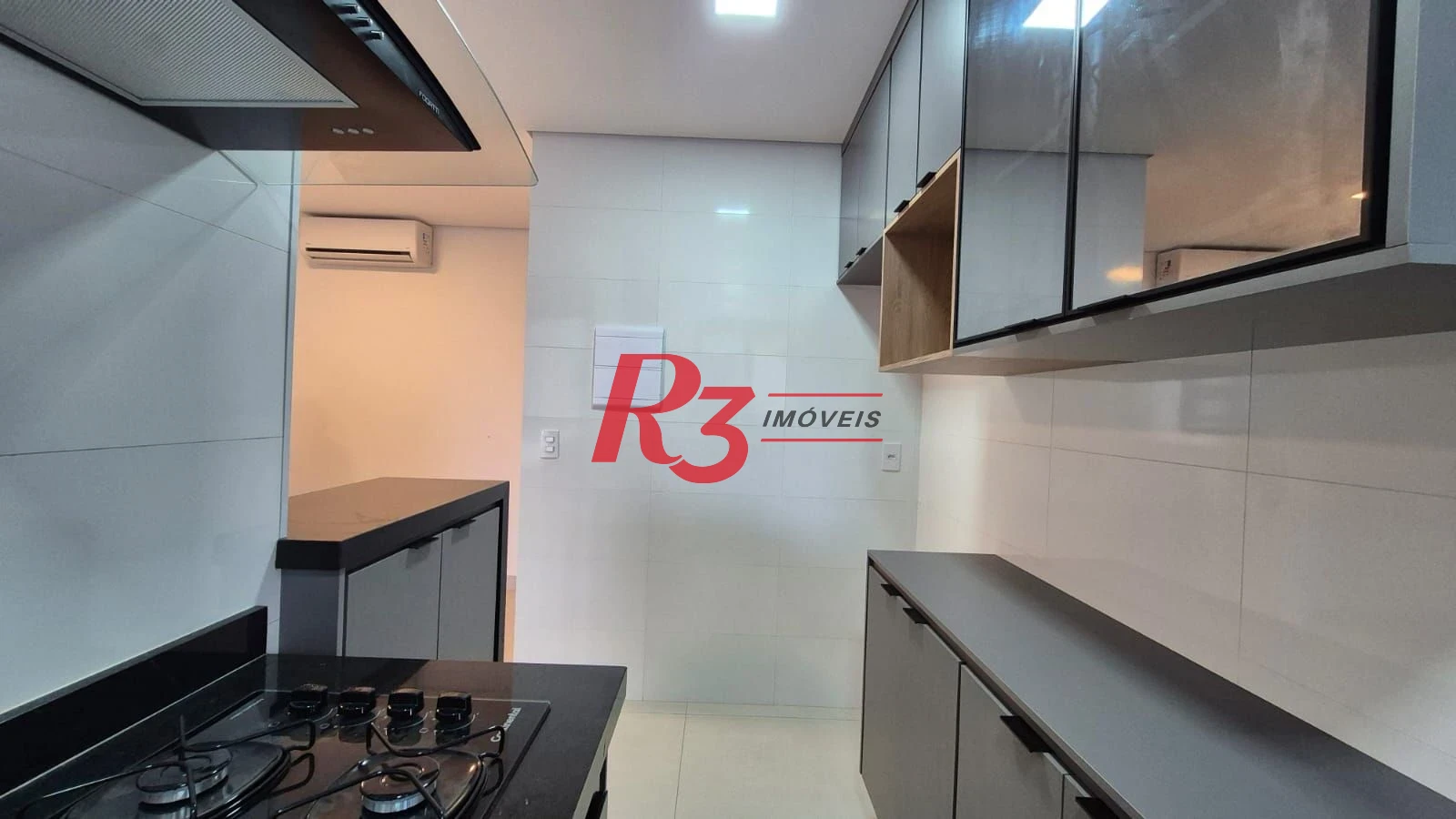 Apartamento com 1 dormitório para alugar, 55 m² por R$ 5.100,02/mês - Aparecida - Santos/SP