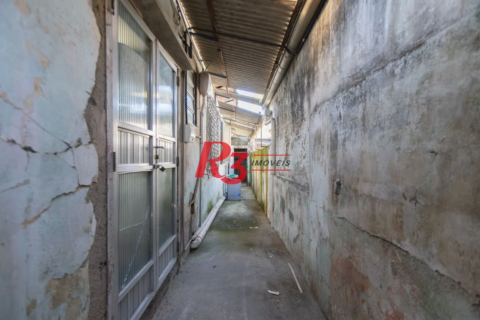 Casa com 2 dormitórios à venda, 157 m² por R$ 600.000,00 - Estuário - Santos/SP