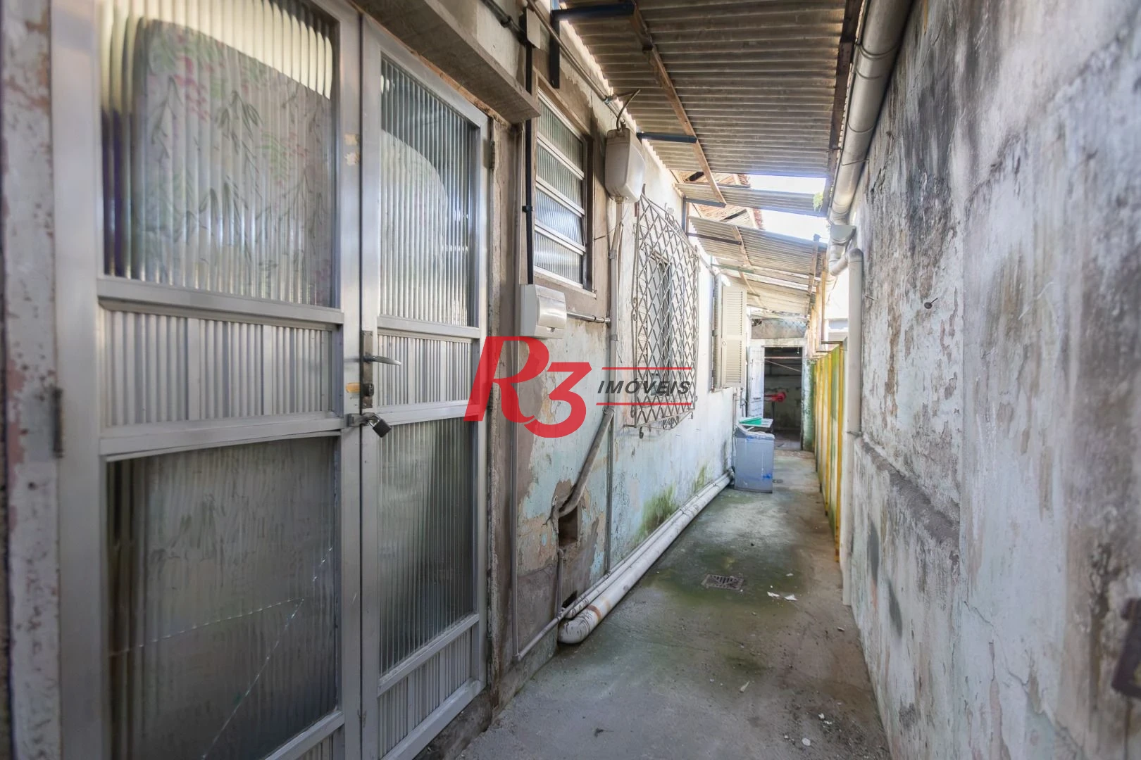 Casa com 2 dormitórios à venda, 157 m² por R$ 600.000,00 - Estuário - Santos/SP