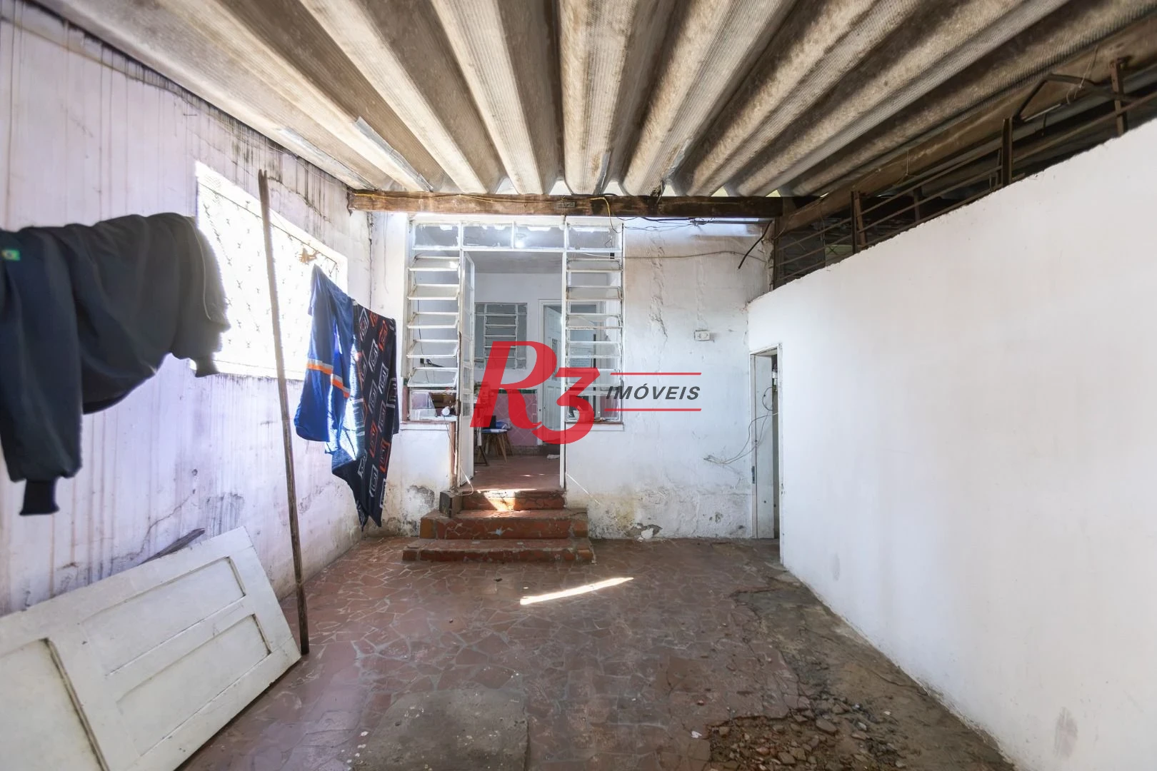 Casa com 2 dormitórios à venda, 157 m² por R$ 600.000,00 - Estuário - Santos/SP