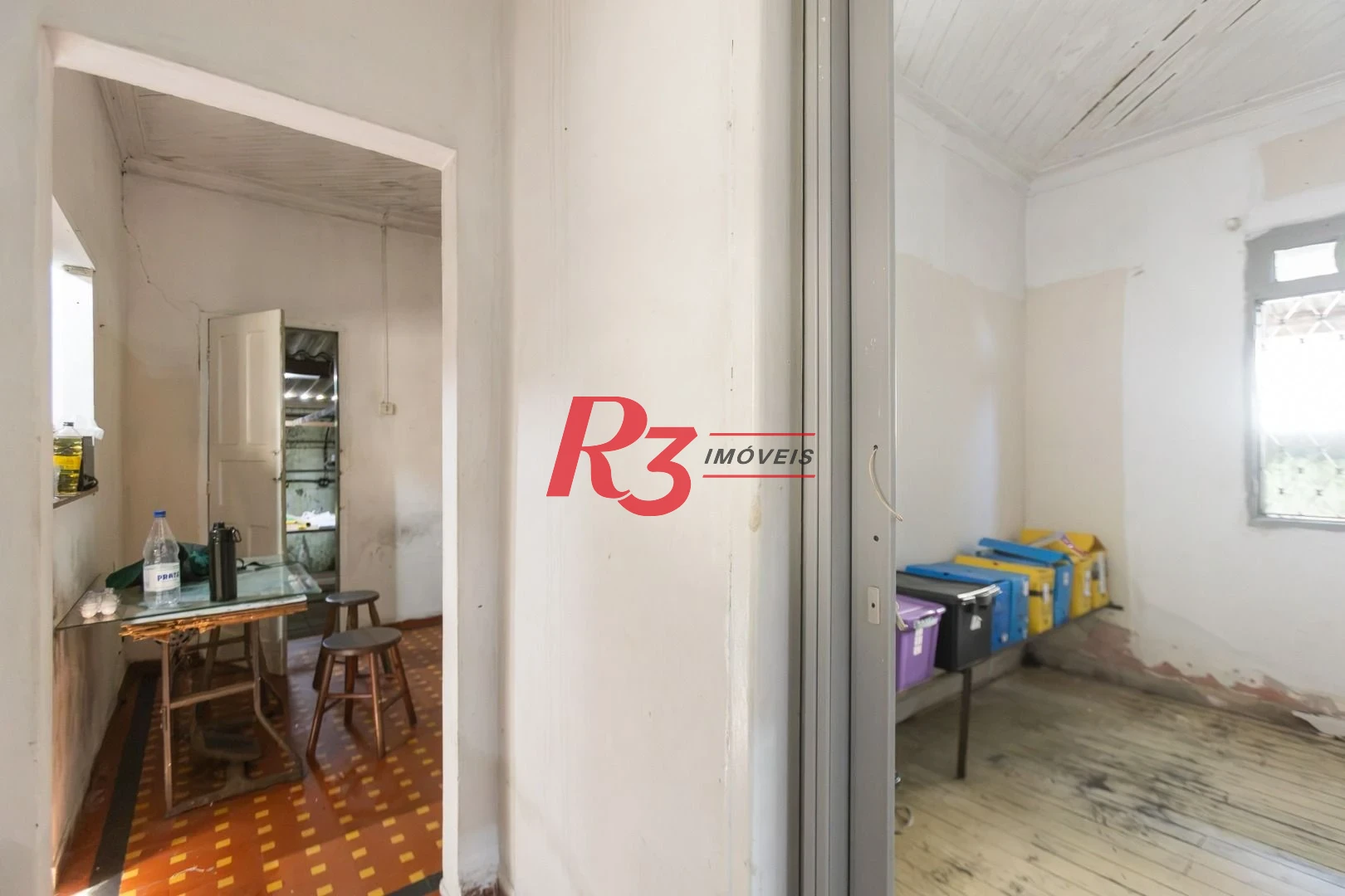 Casa com 2 dormitórios à venda, 157 m² por R$ 600.000,00 - Estuário - Santos/SP