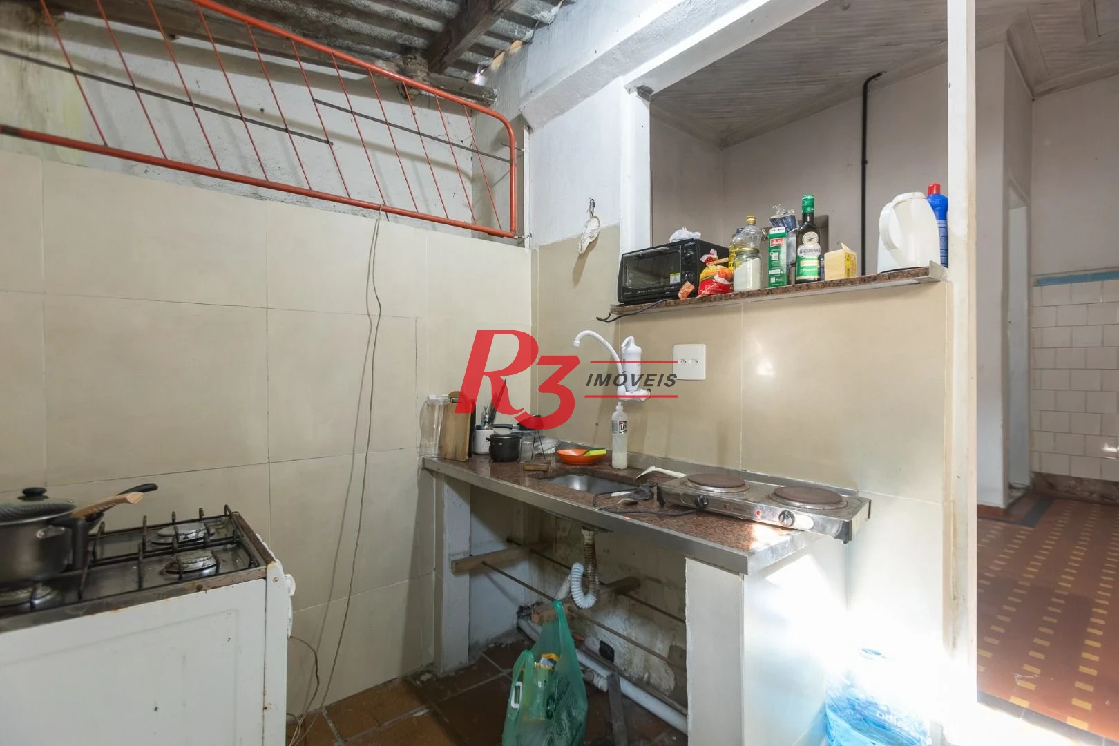 Casa com 2 dormitórios à venda, 157 m² por R$ 600.000,00 - Estuário - Santos/SP