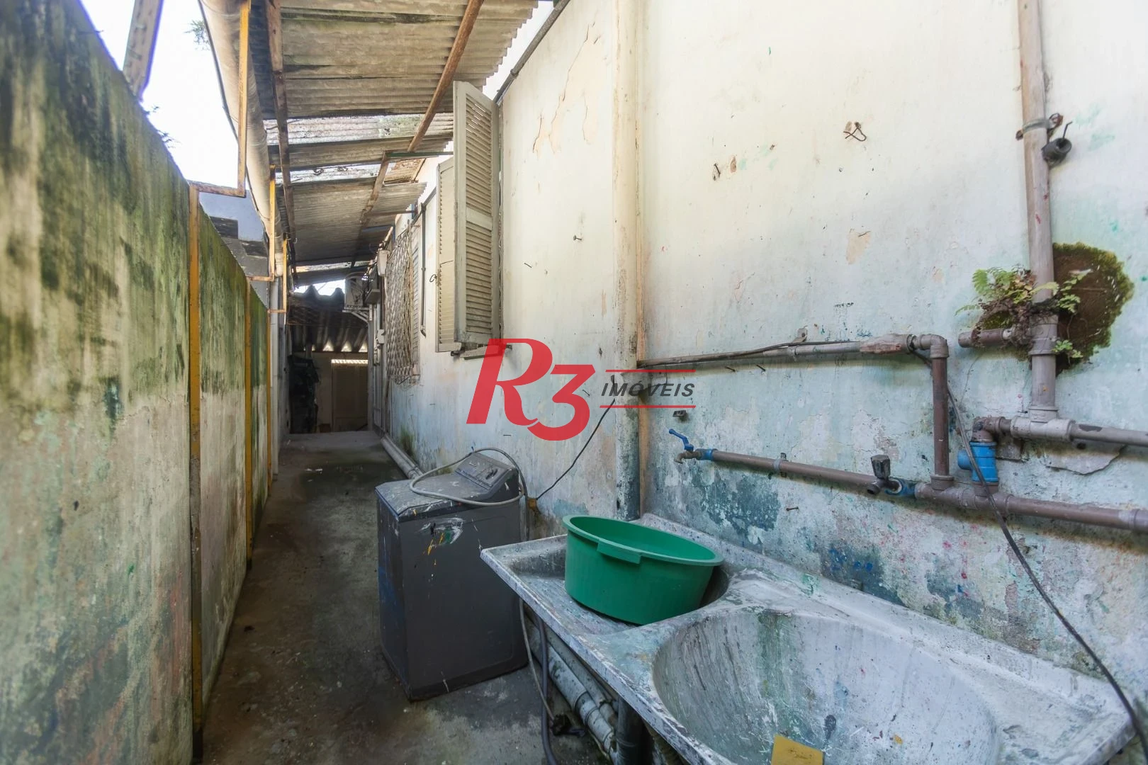 Casa com 2 dormitórios à venda, 157 m² por R$ 600.000,00 - Estuário - Santos/SP