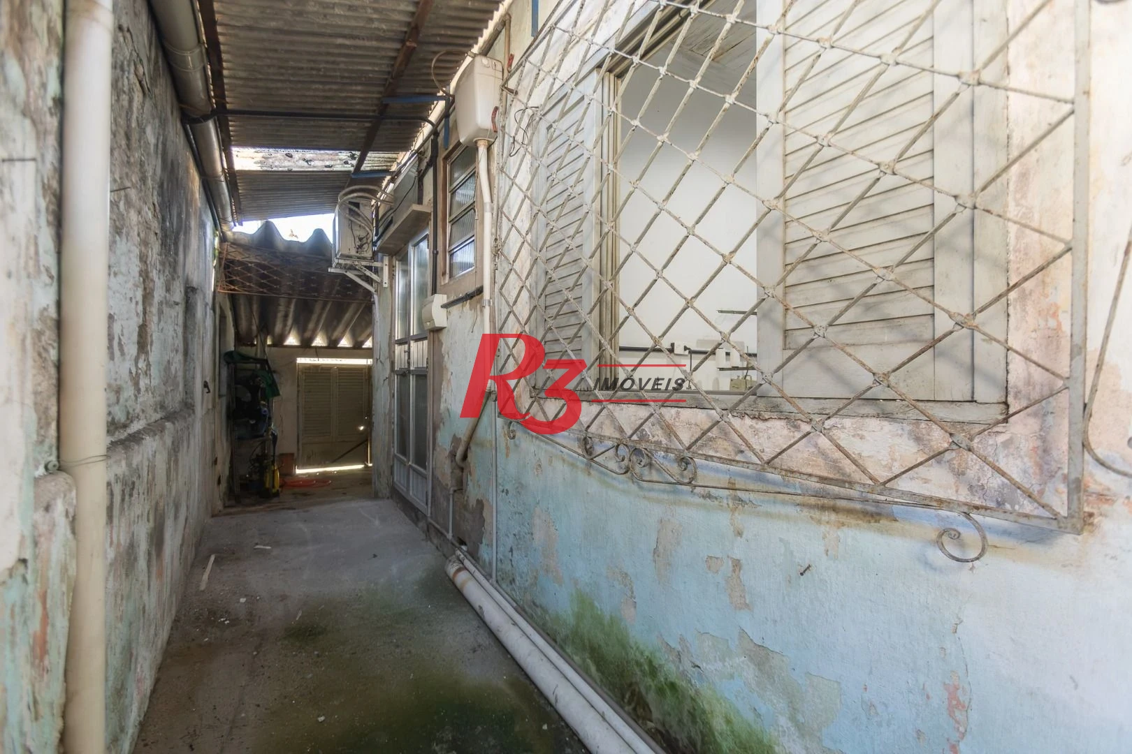 Casa com 2 dormitórios à venda, 157 m² por R$ 600.000,00 - Estuário - Santos/SP