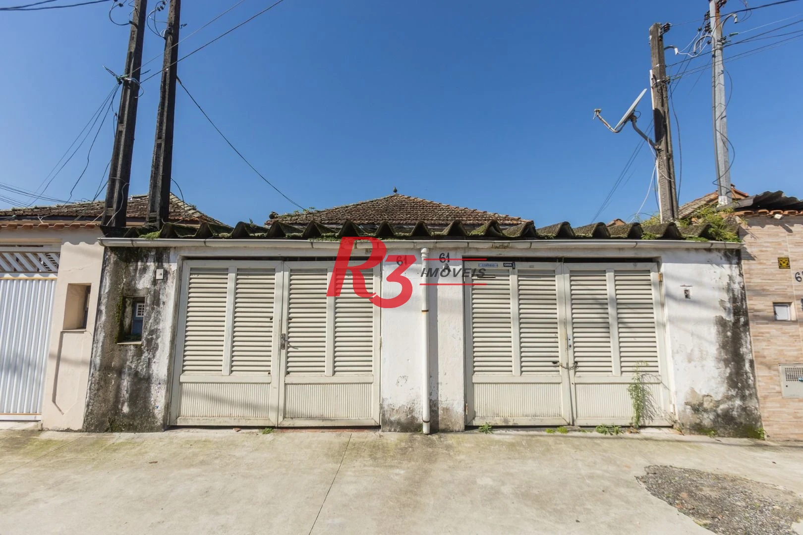 Casa com 2 dormitórios à venda, 157 m² por R$ 600.000,00 - Estuário - Santos/SP
