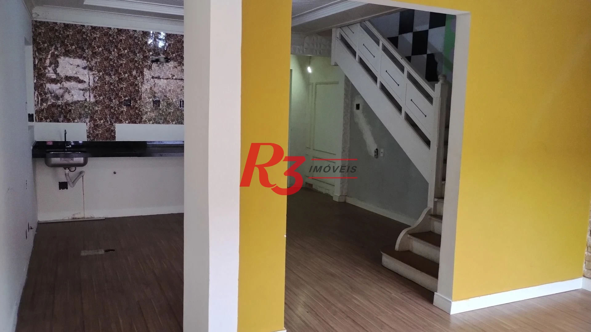 Casa com 3 dormitórios para alugar, 127 m² por R$ 6.424,34/mês - Boqueirão - Santos/SP